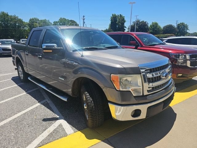 2013 Ford F-150 XLT in Gray — front three-quarter view