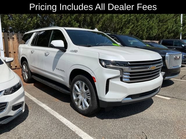 2023 Chevrolet Suburban High Country in Iridescent Pearl Tricoat — front three-quarter view