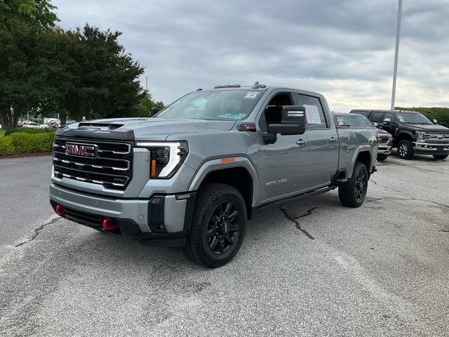 2025 GMC Sierra 2500 HD AT4 in Sterling Metallic — front three-quarter view