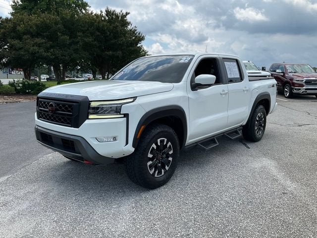 2022 Nissan Frontier Crew Cab PRO-4X 4x4 in White — front three-quarter view